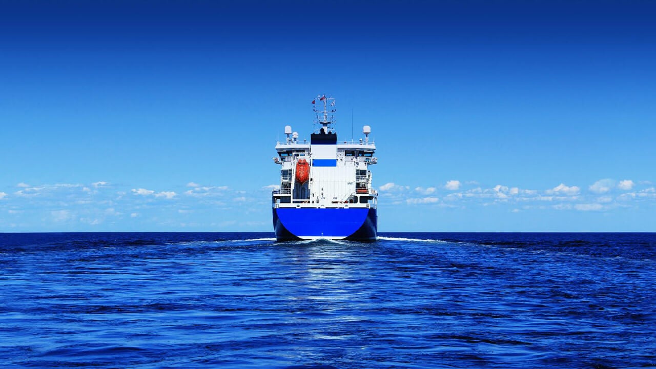 Ship sailing back to sea after dry dock service